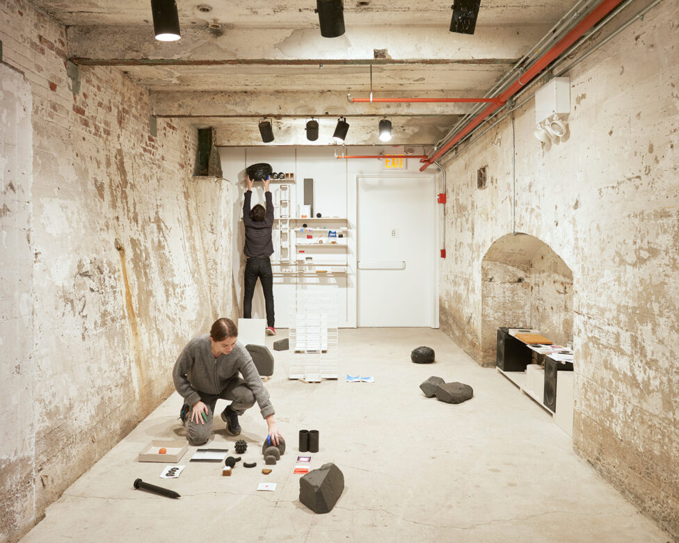 People creating in a space with various materials. Lauren Bakst & Yuri Masnyj, Temporary Walls, 2017, In Practice: Material Deviance, SculptureCenter, New York. Photo by Kyle Knodell