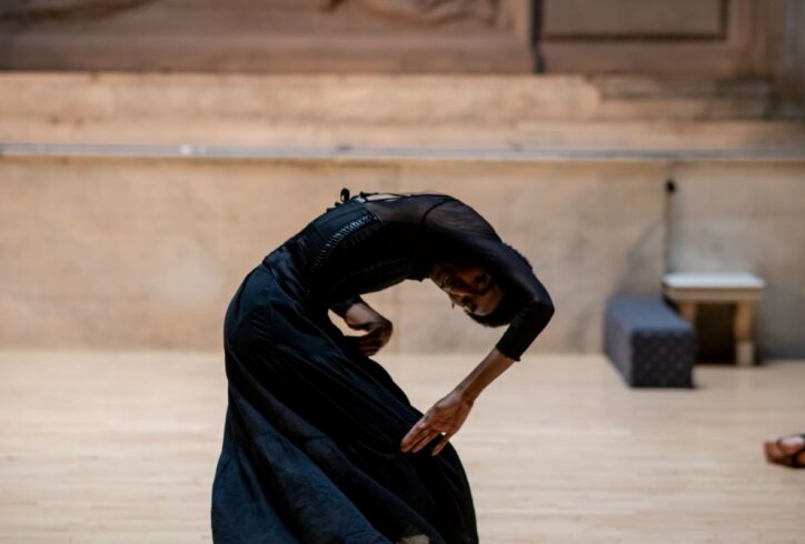 MR@Judson. Ke'ron J. Wilson; she hunches over in all black. Photo by Rachel Keane.