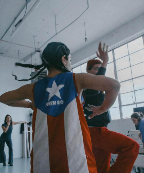 Two afro-latinx dancers are voguing. Photo by Camila Falquez.
