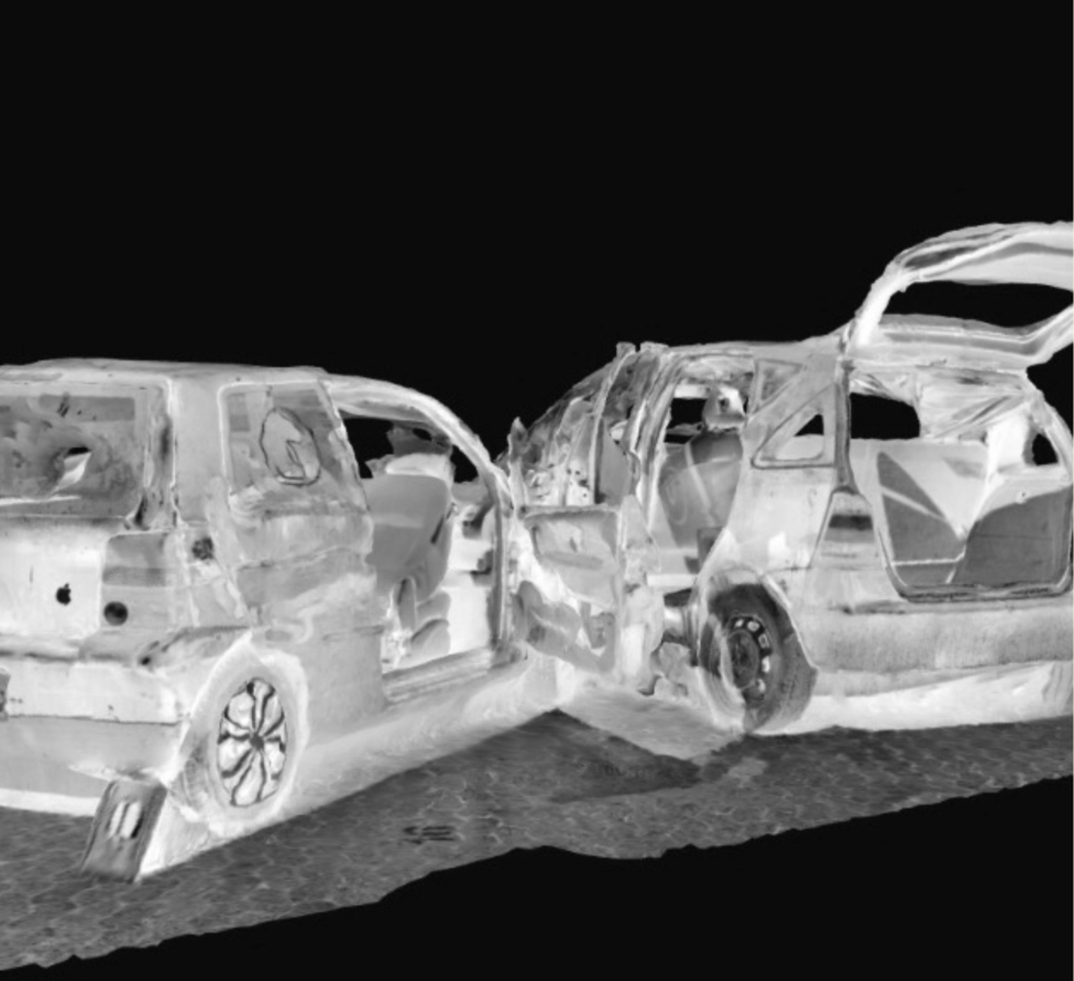 Image sourced of a 3D scan from Polycam, with further post editing by Jordan Deal. Image displays a black and white inversion of a collision between two cars